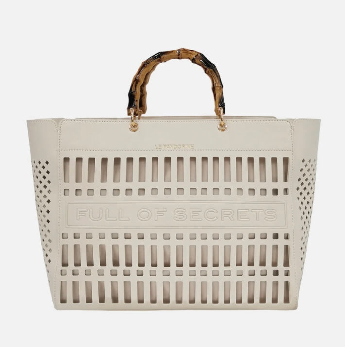 BORSA A MANO LASERATA COLORE BIANCO