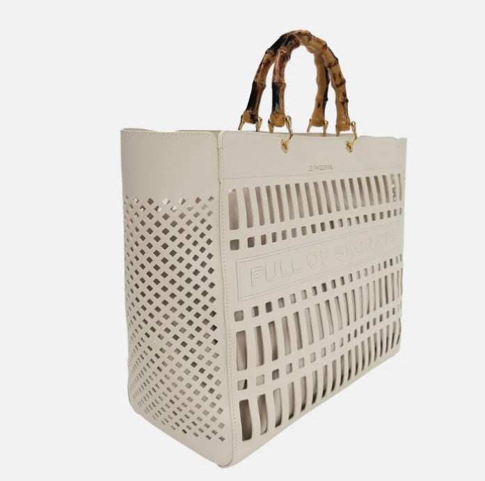 BORSA A MANO LASERATA COLORE BIANCO
